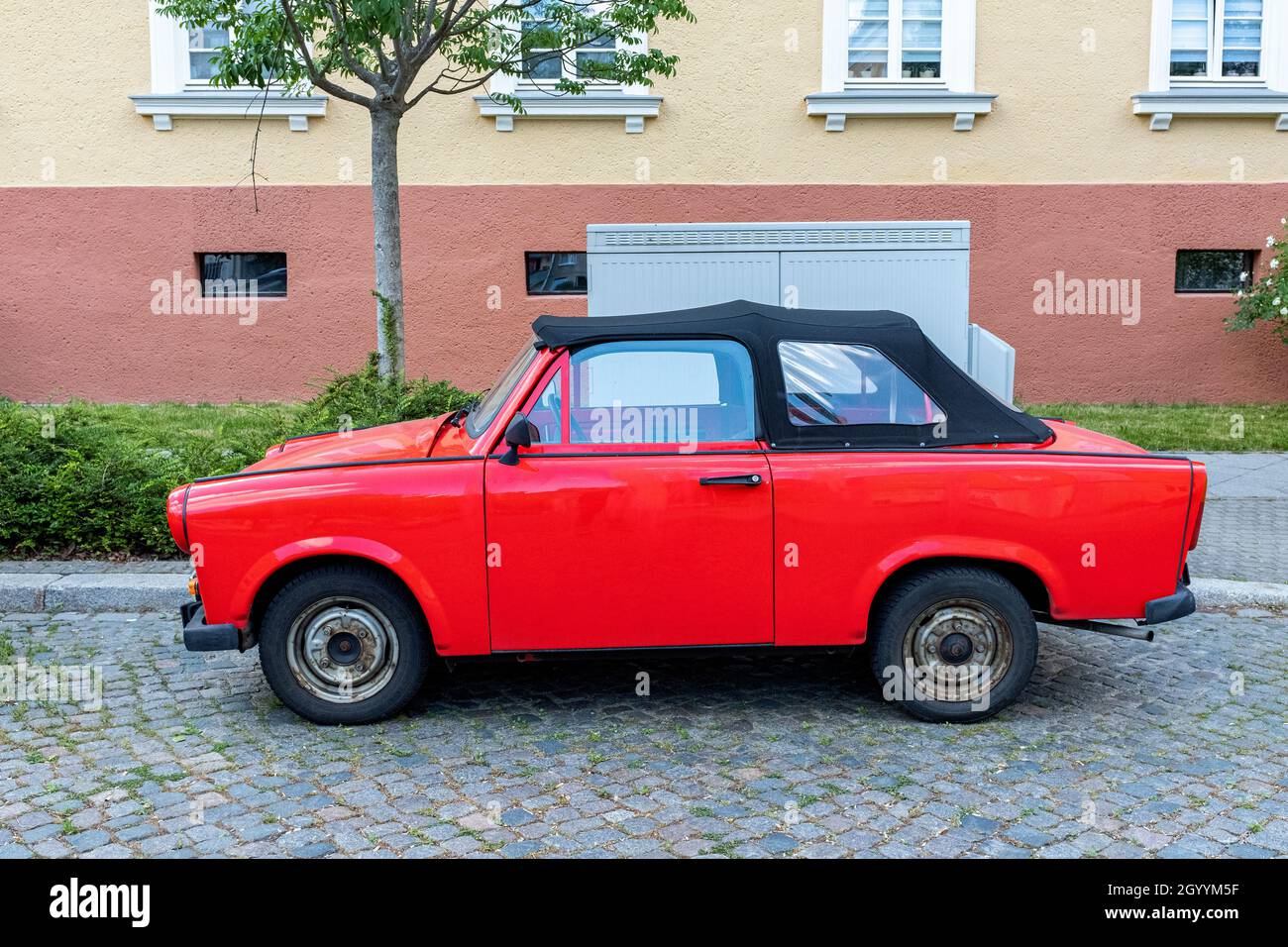 Frankfurt Oder, Germany. Totally refurbished DDR / GDR / East-German Trabi Cabriolet Car with red paint job. Trabi's are now a culture thing. Stock Photo