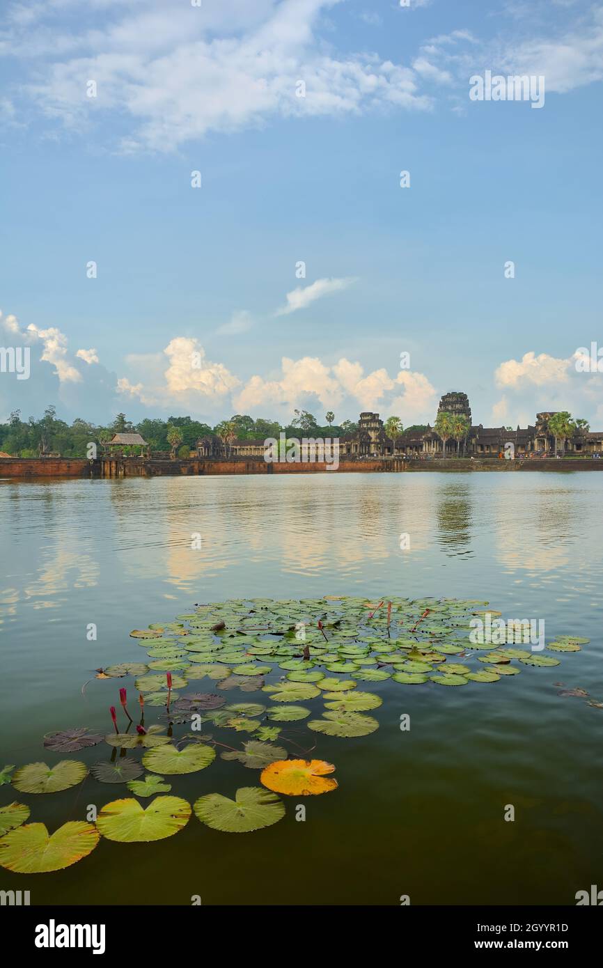 Angkor Wat Sandstone causeway reflected in the external moat, Cambodia