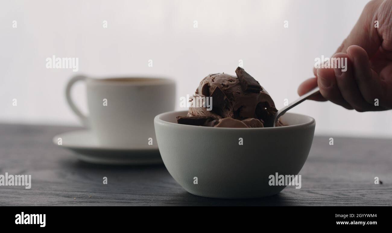 eat chocolate ice cream into white bowl with espresso on black wood