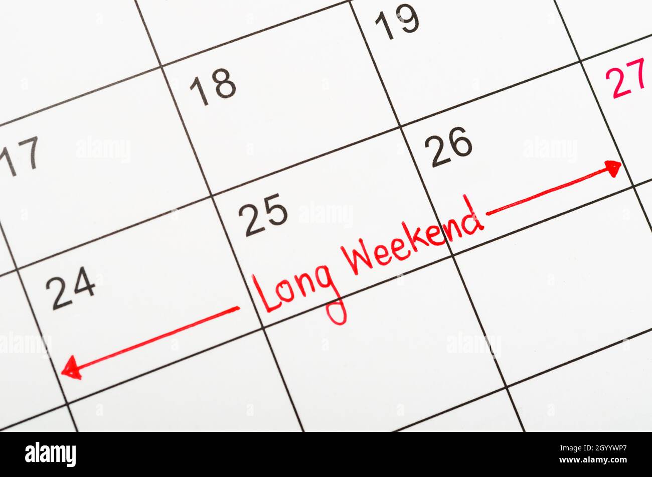 Long weekend red text written on a calendar to remind you and important