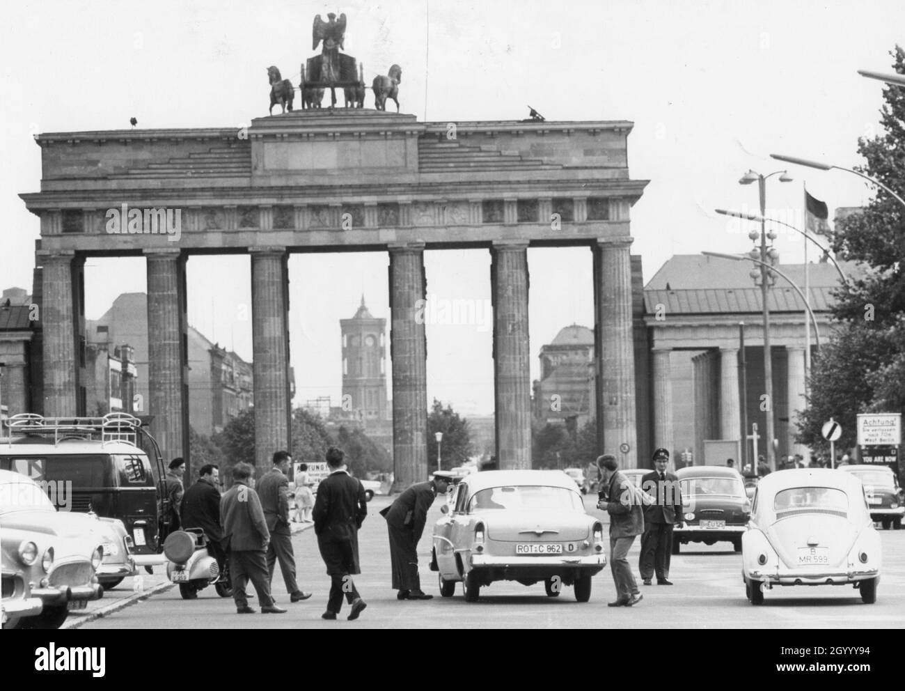 In front of the Brandenberg Gate which marks the border between East and West Berlin, West Berlin police warn motorists about the danger of entering East Berlin. The East Germans have barred West Germans from entering East Berlin, but West Berliners were still traveling freely. West Berlin, August 21, 1960. Stock Photo