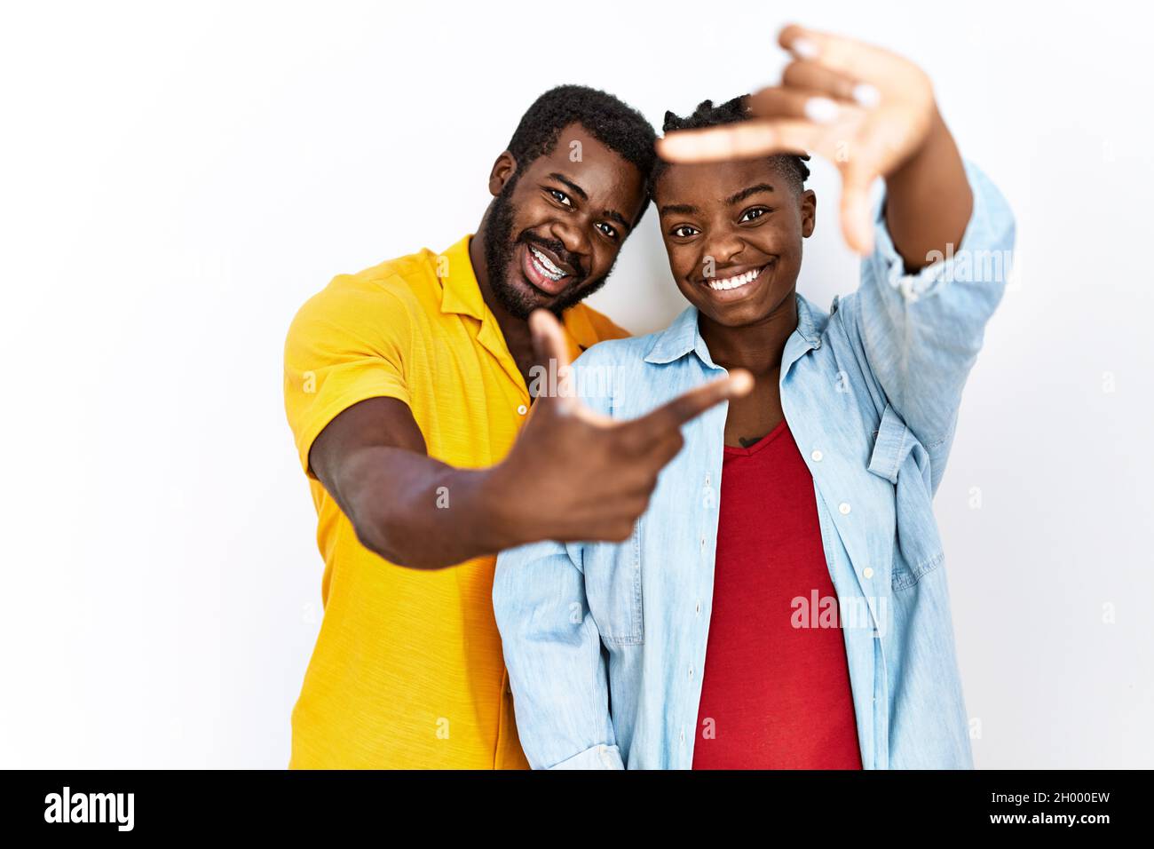 Young african american couple wearing casual clothes smiling making ...