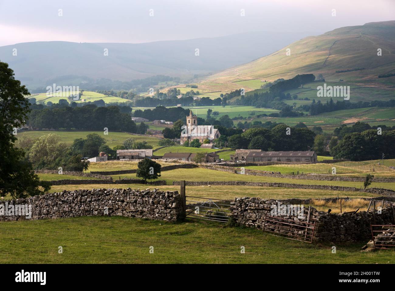 View down to the market town of Hawes in Wensleydale, Yorkshire Dales National Park, UK. St Margaret's Church in centre. Stock Photo