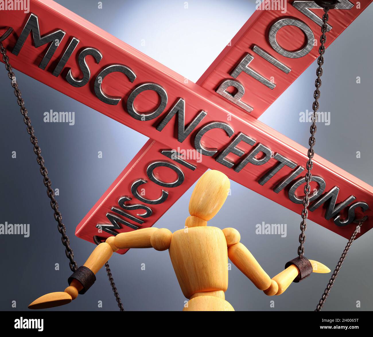 Misconceptions control, power, authority and manipulation symbolized by control bar with word Misconceptions pulling the strings (chains) of a wooden Stock Photo