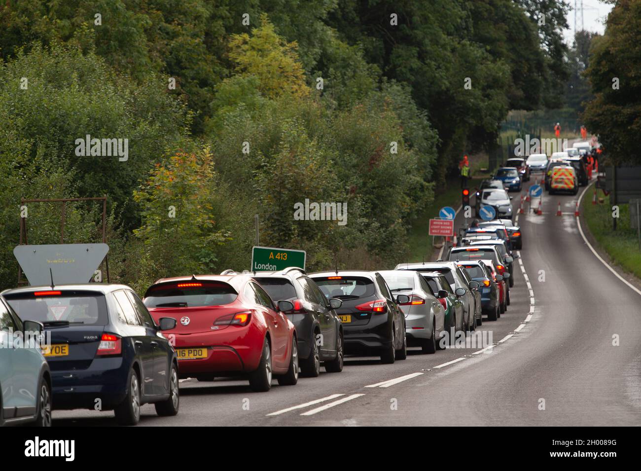 Aylesbury Vale, UK. 10th October, 2021. HS2 caused huge traffic jams on the A413 today. National Eviction Team bailiffs working for HS2 assisted by HS2 Security and Thames Valley Police were trying to evict anti HS2 protesters holed up in big woodland fortresses at the WAR Against HS2 camp this morning. The land off the A413 just outside Wendover is owned by Buckinghamshire Council but has been seized by court order by HS2 Ltd. The High Speed Rail 2 rail construction is having a devastating impact upon woodland and wildlife sites in Wendover. Credit: Maureen McLean/Alamy Live News Stock Photo