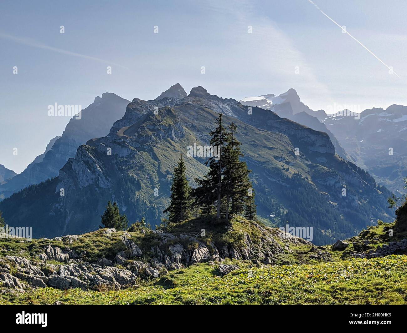 autumn hike in beautiful switzerland. outdoor activity climbing a high mountain. mountaineering silbern im cantin uri Stock Photo