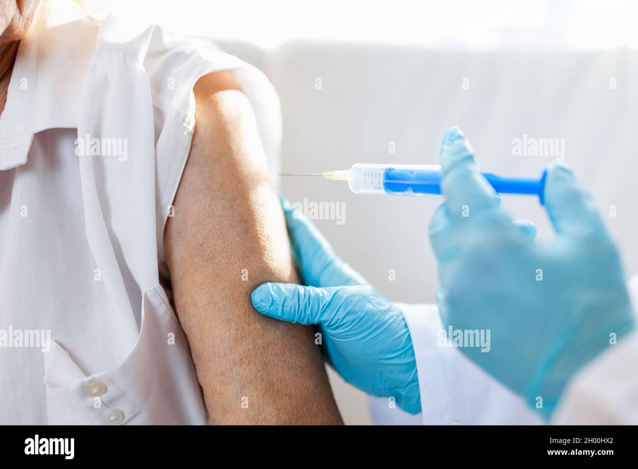 Covid vaccine injection doctor hi-res stock photography and images - Alamy