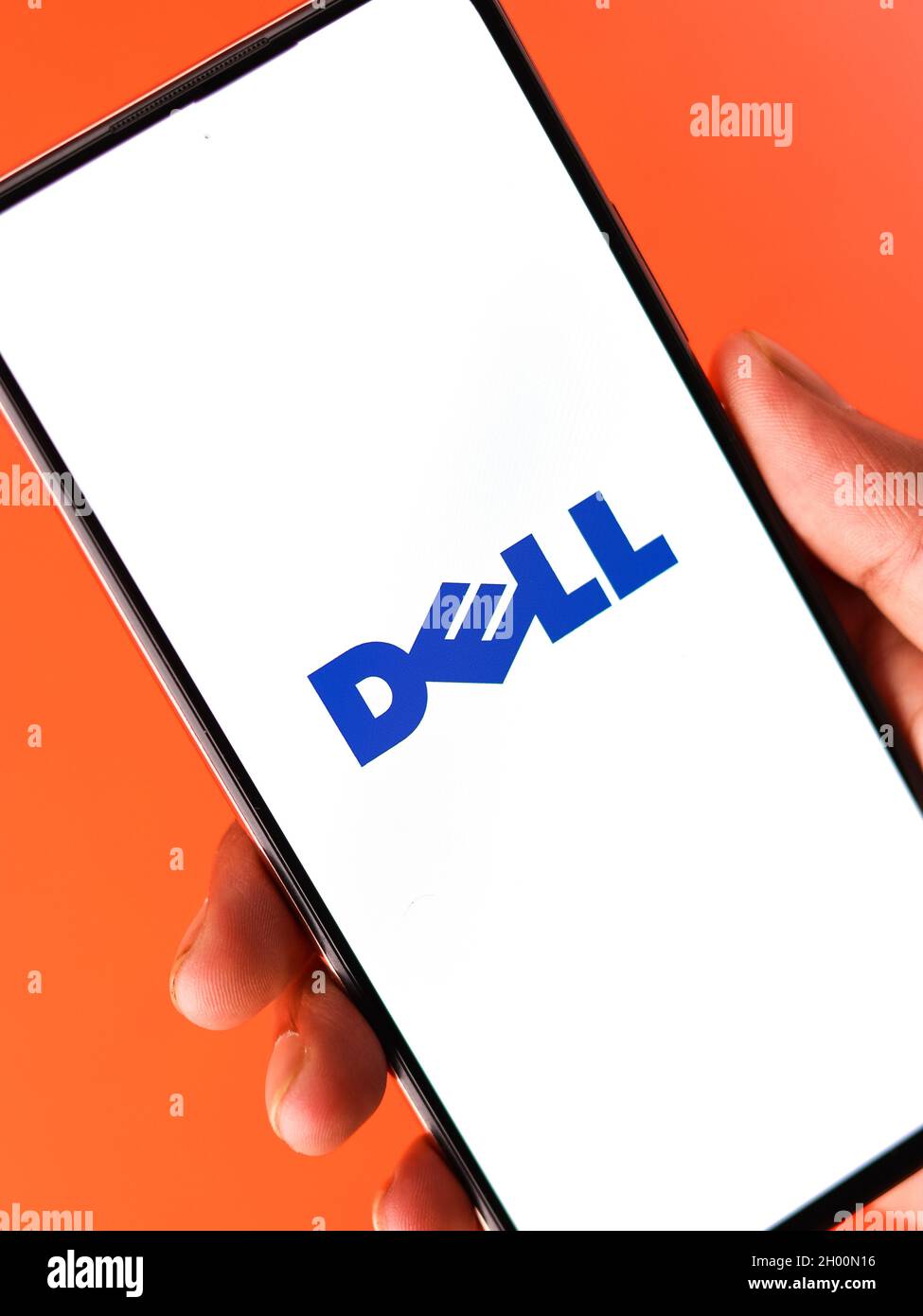 West Bangal, India - October 09, 2021 : Dell logo on phone screen stock image. Stock Photo