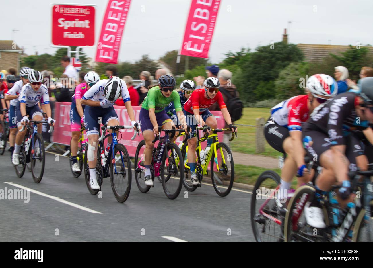 AJ Bell women's cycling tour 2021 stage 5 Colchester to Clacton. Elise Chabbey wears the green QOM jersey and Nina Kessler the red sprint jersey Stock Photo