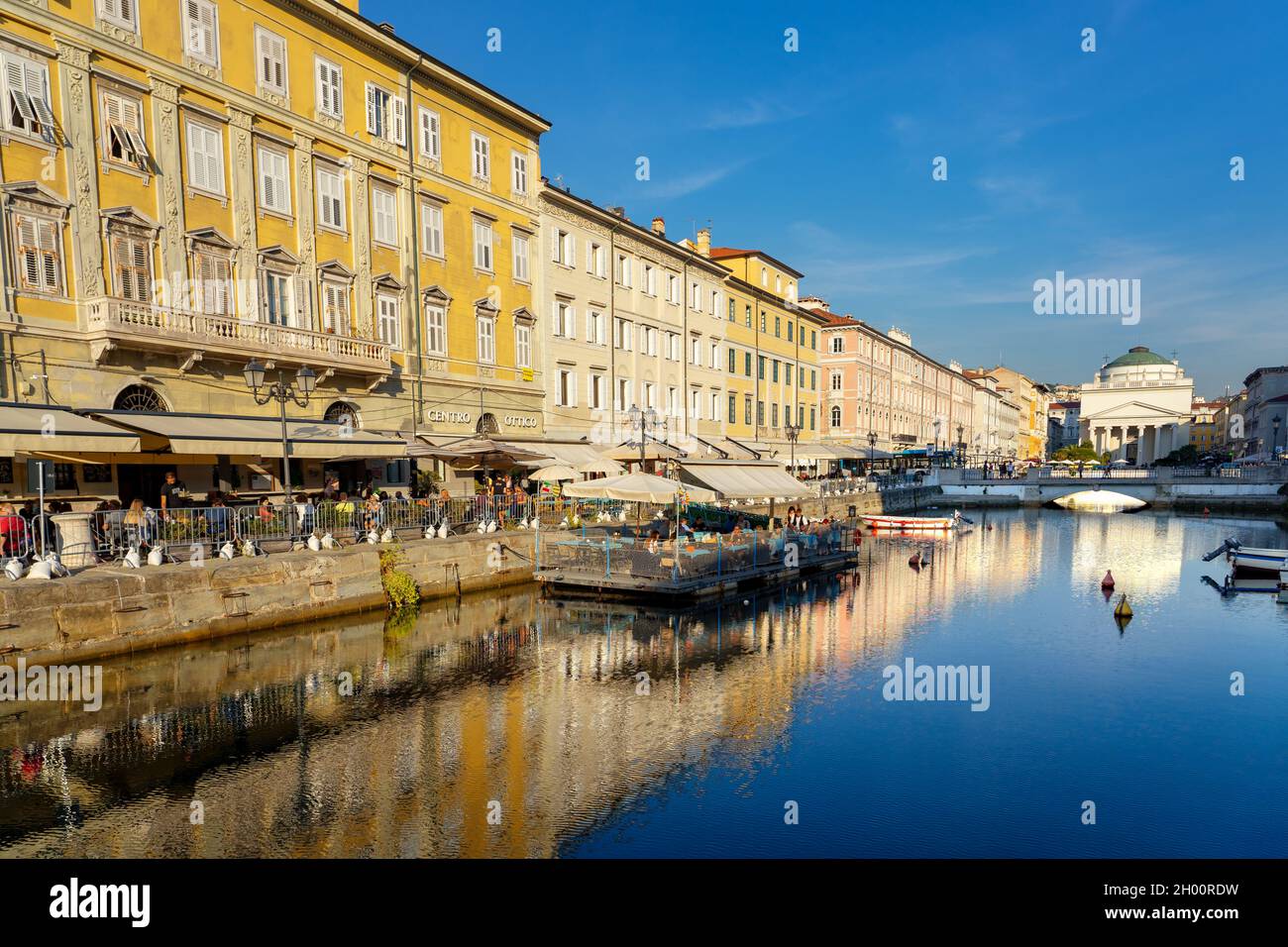 11.08.2021: Trieste, Italy: Canal Grande di Trieste with la chiesa di sant antonio church daytime . Stock Photo
