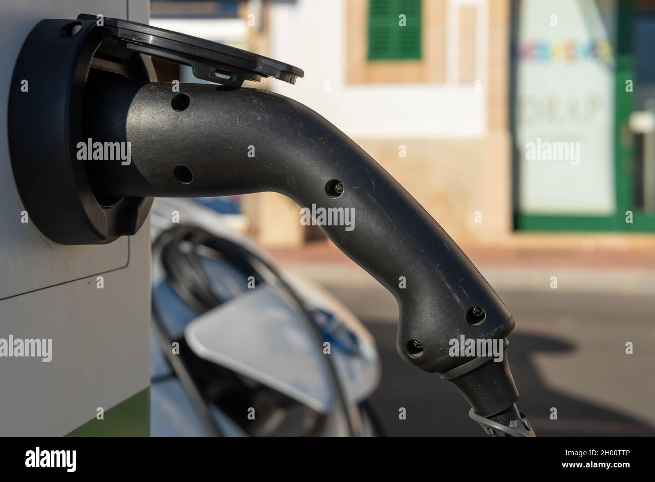 Plugged into charging port hires stock photography and images Alamy