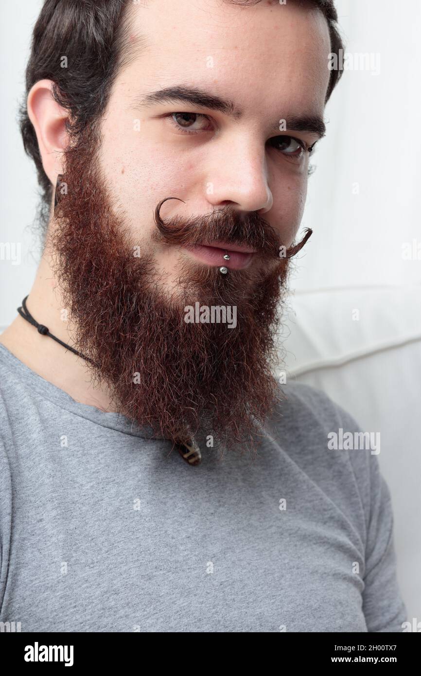 portrait of a winking boy who shares feelings with you, the observer, who feels involved in this fascinating gaze Stock Photo