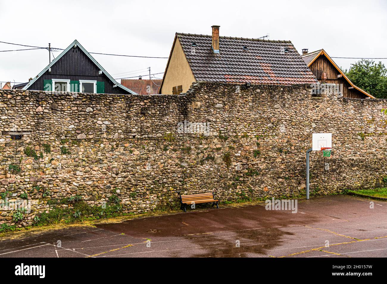Basketball at the old city wall of Kientzheim, Kaysersberg, France Stock Photo