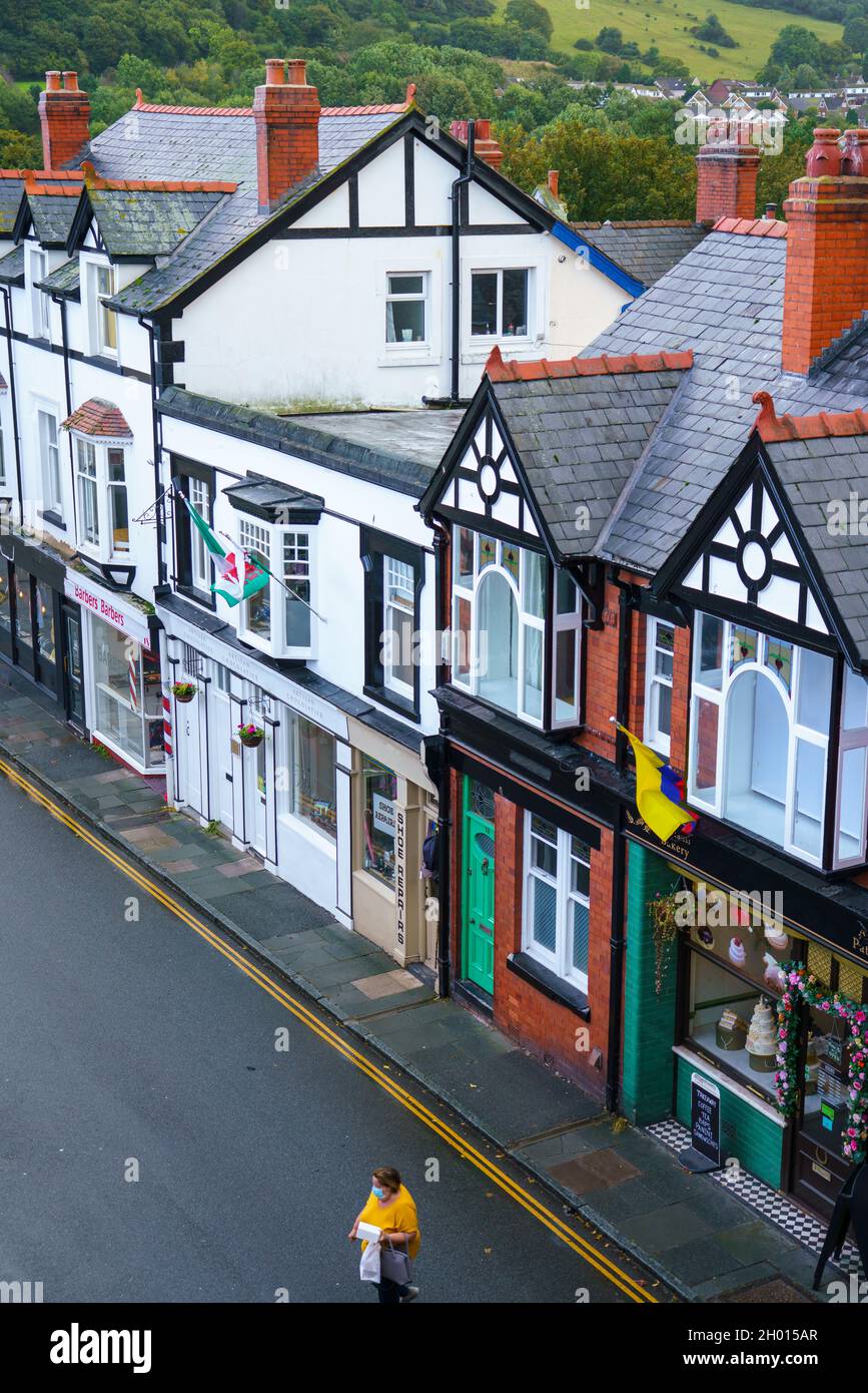a row of colourful vintage high street shop fronts in Conwy North Wales Stock Photo