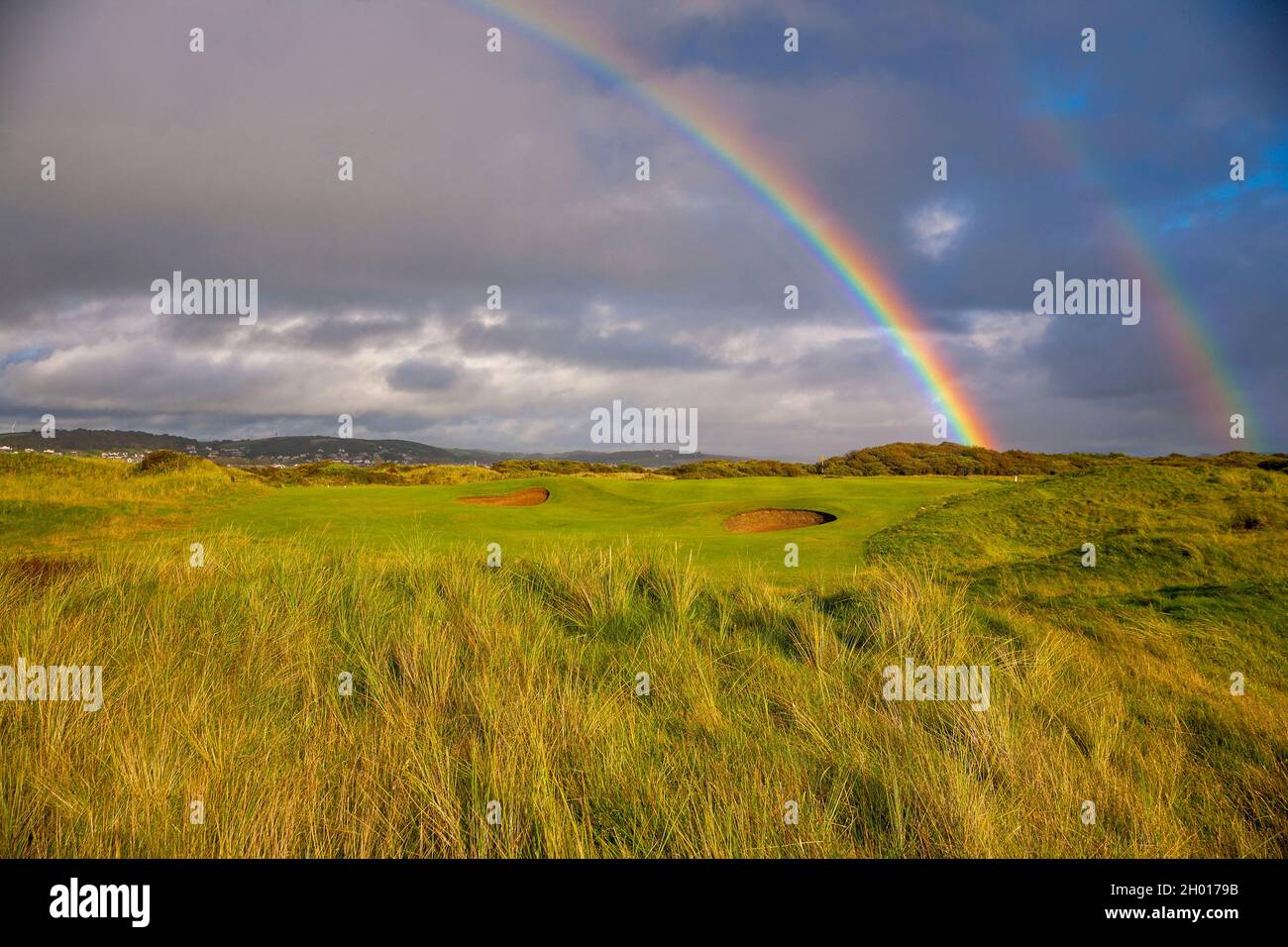 Double rainbow on golf course in Devon, England. Stock Photo