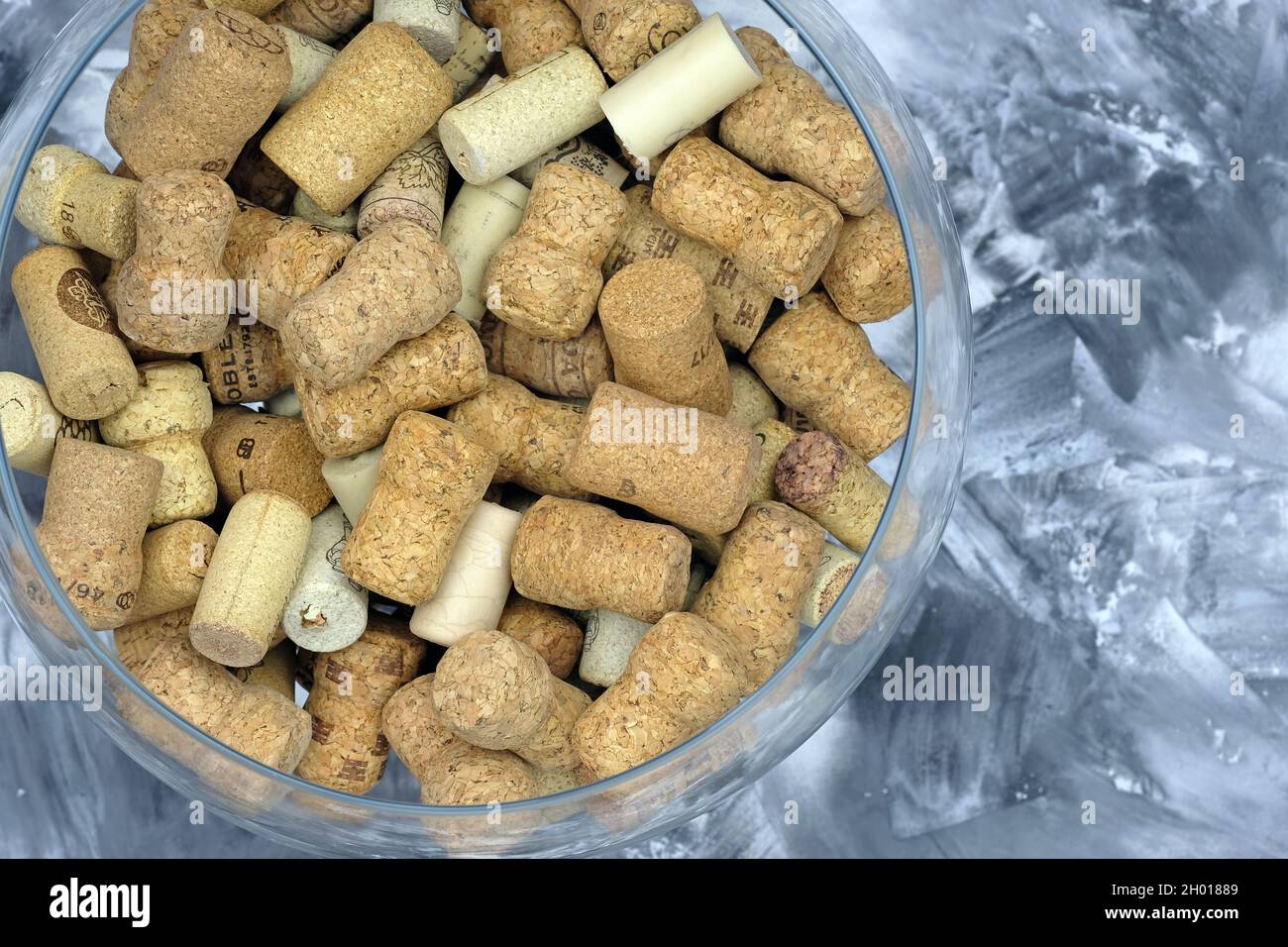 Natural cork of different companies and manufacturers from wine top view. Micro corks for wine