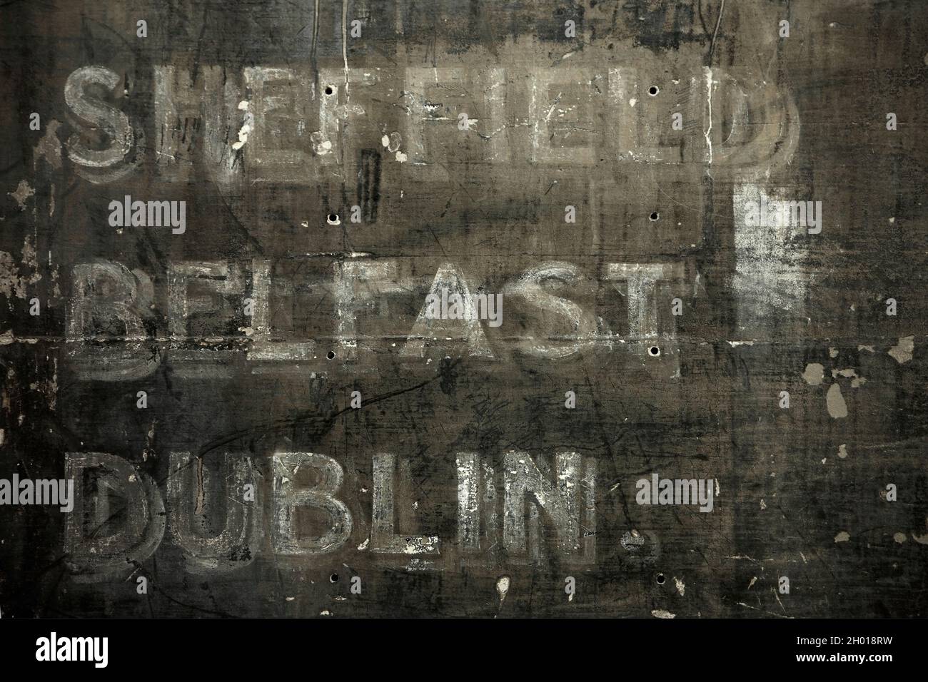 Old sign on shopfront in Victoria Street, Edinburgh listing branch locations in the UK and Ireland. Stock Photo