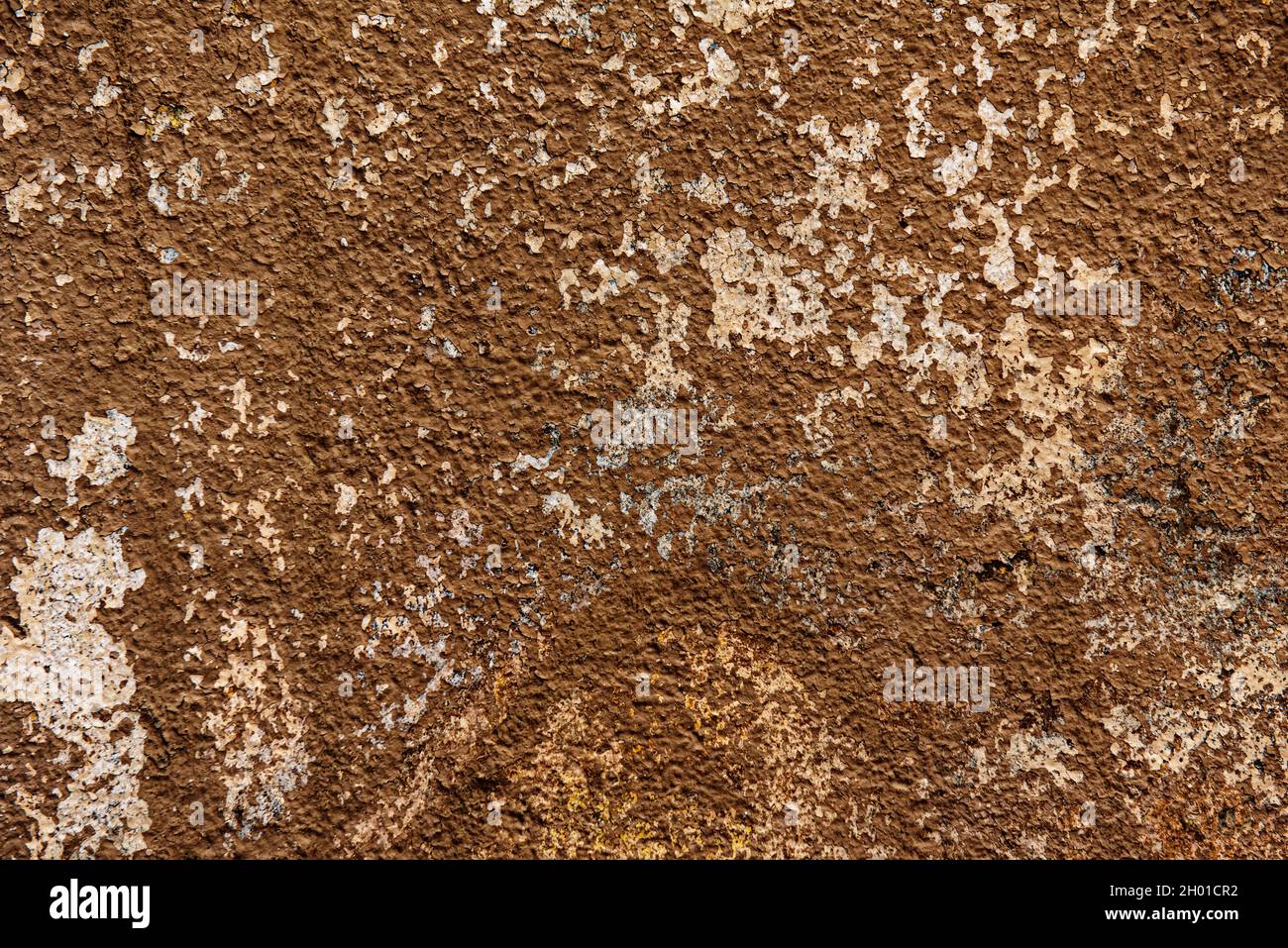 Wall painted many times with various colors that fade over time. Vector brown paint texture