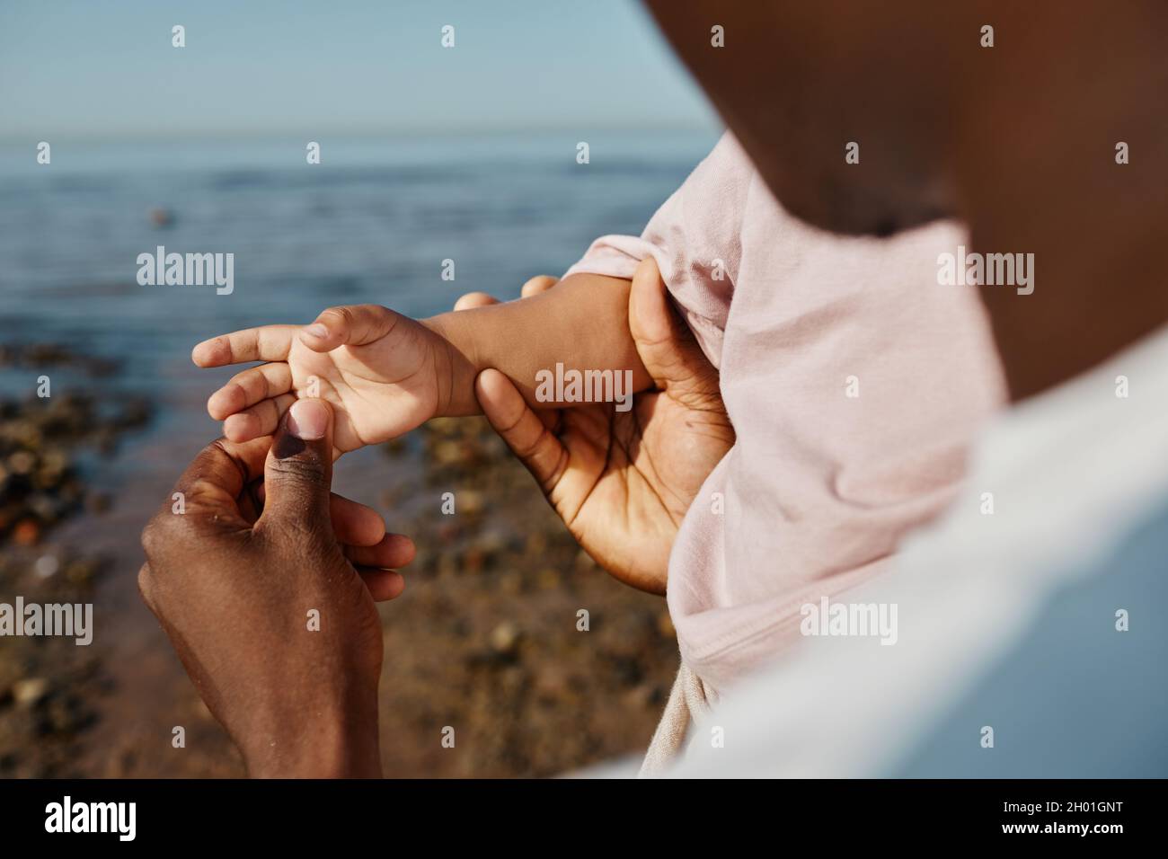 African father and son holding hands hi-res stock photography and ...