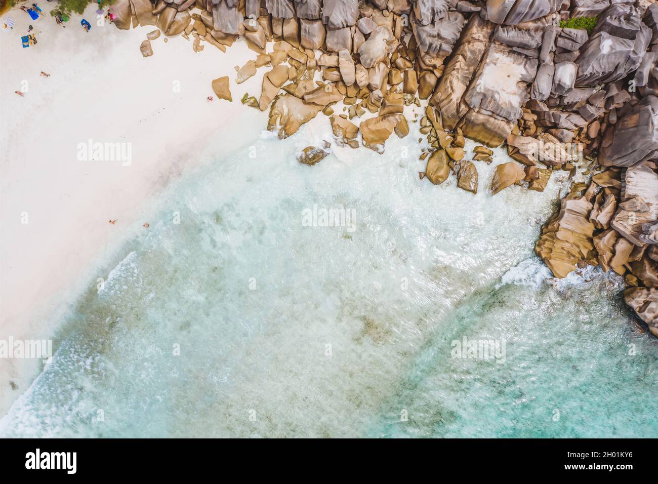 Aerial photo of Seychelles tropical beach Anse Source d'Argent in evening light at La Digue island, highlights Seychelles Stock Photo