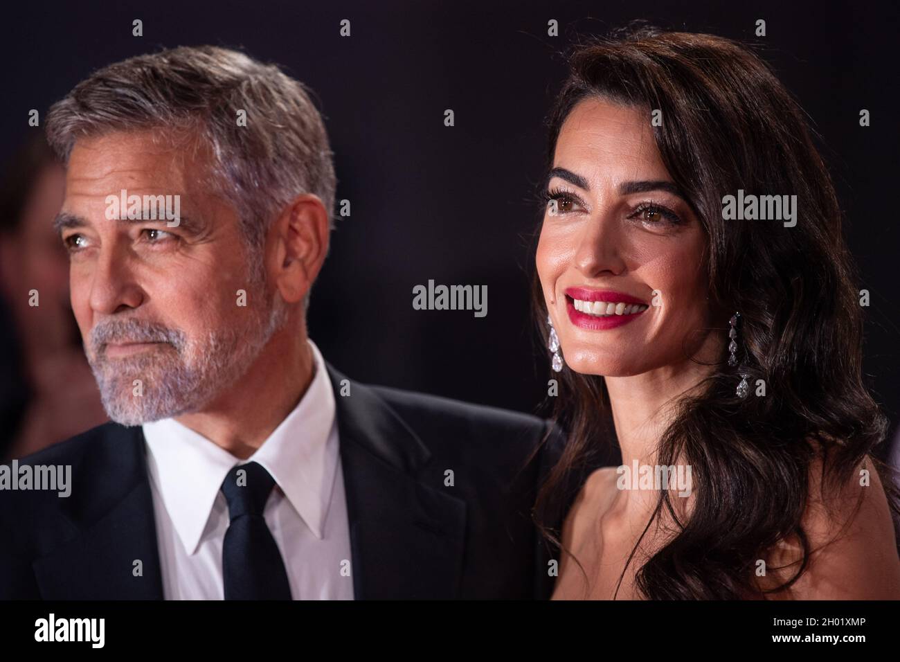 London, UK. 10 October 2021. George Clooney and wife Amal Clooney arrive for the UK premiere of 'The Tender Bar', at the Royal Festival Hall in London during the BFI London Film Festival Picture date: Sunday October 10, 2021. Photo credit should read: Matt Crossick/Empics/Alamy Live News Stock Photo