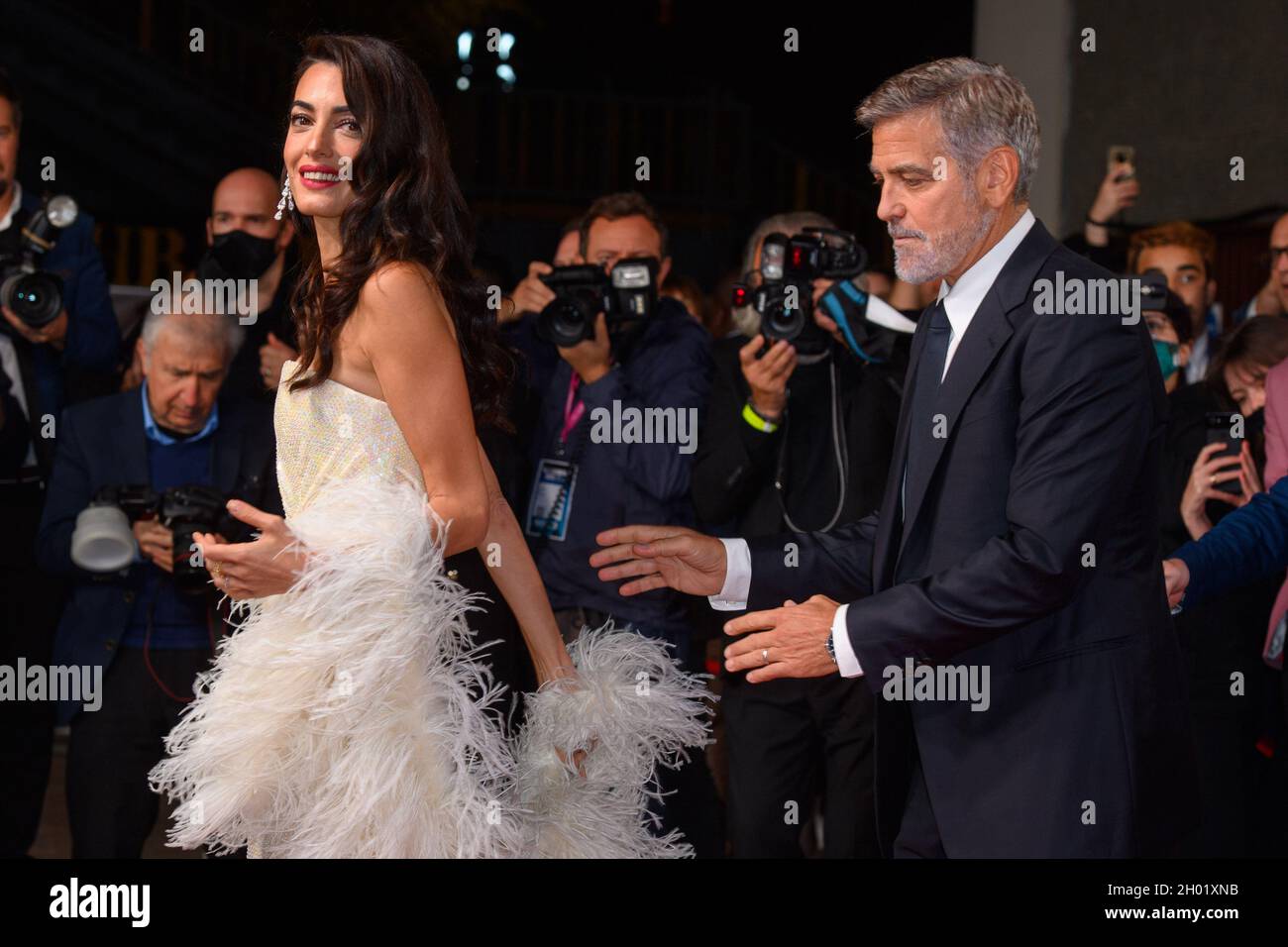 London, UK. 10 October 2021. George Clooney and wife Amal Clooney arrive for the UK premiere of 'The Tender Bar', at the Royal Festival Hall in London during the BFI London Film Festival Picture date: Sunday October 10, 2021. Photo credit should read: Matt Crossick/Empics/Alamy Live News Stock Photo