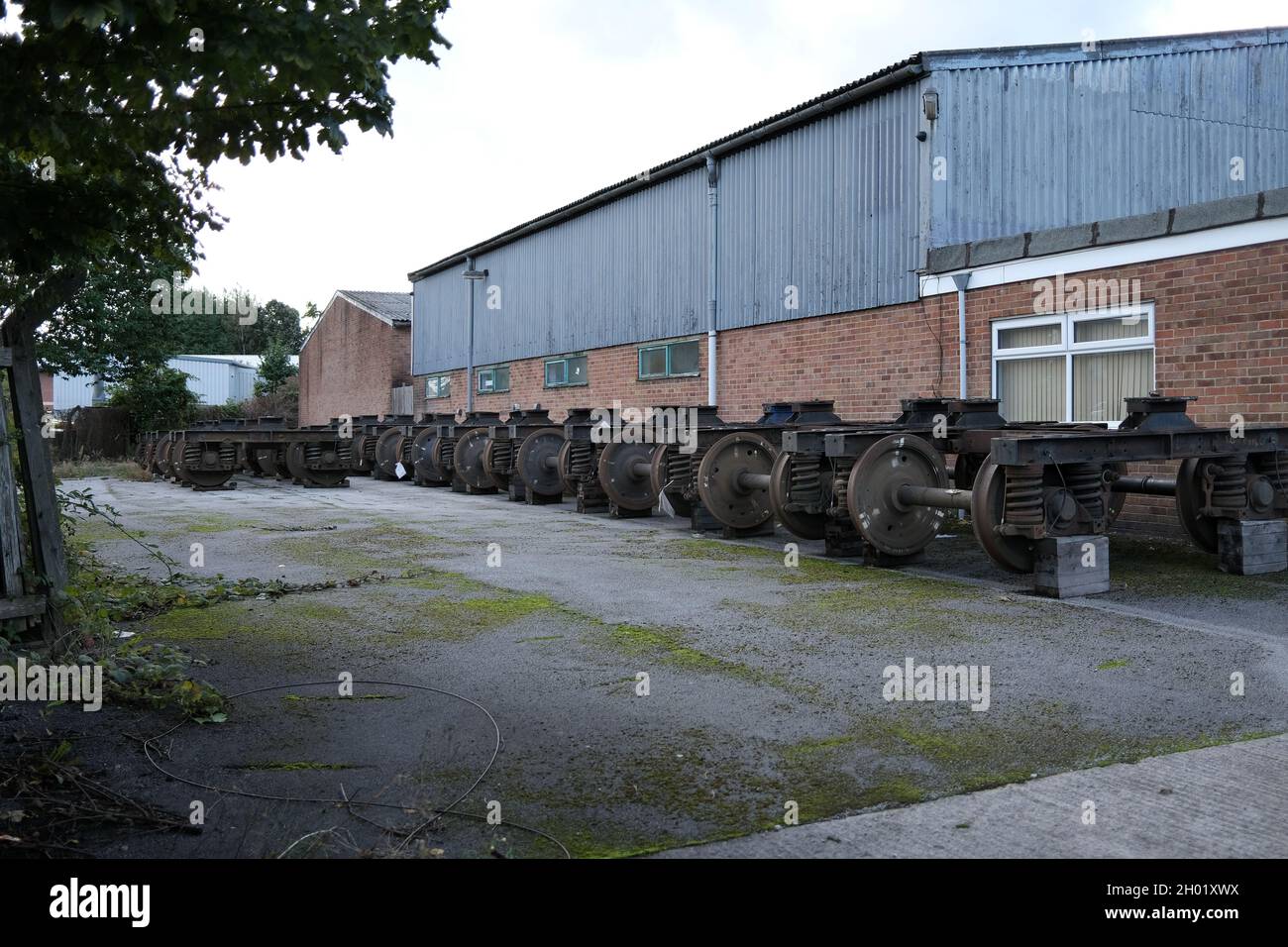 October 2021 - Locomotive and train wheels outside a workshop for refurbishment Stock Photo
