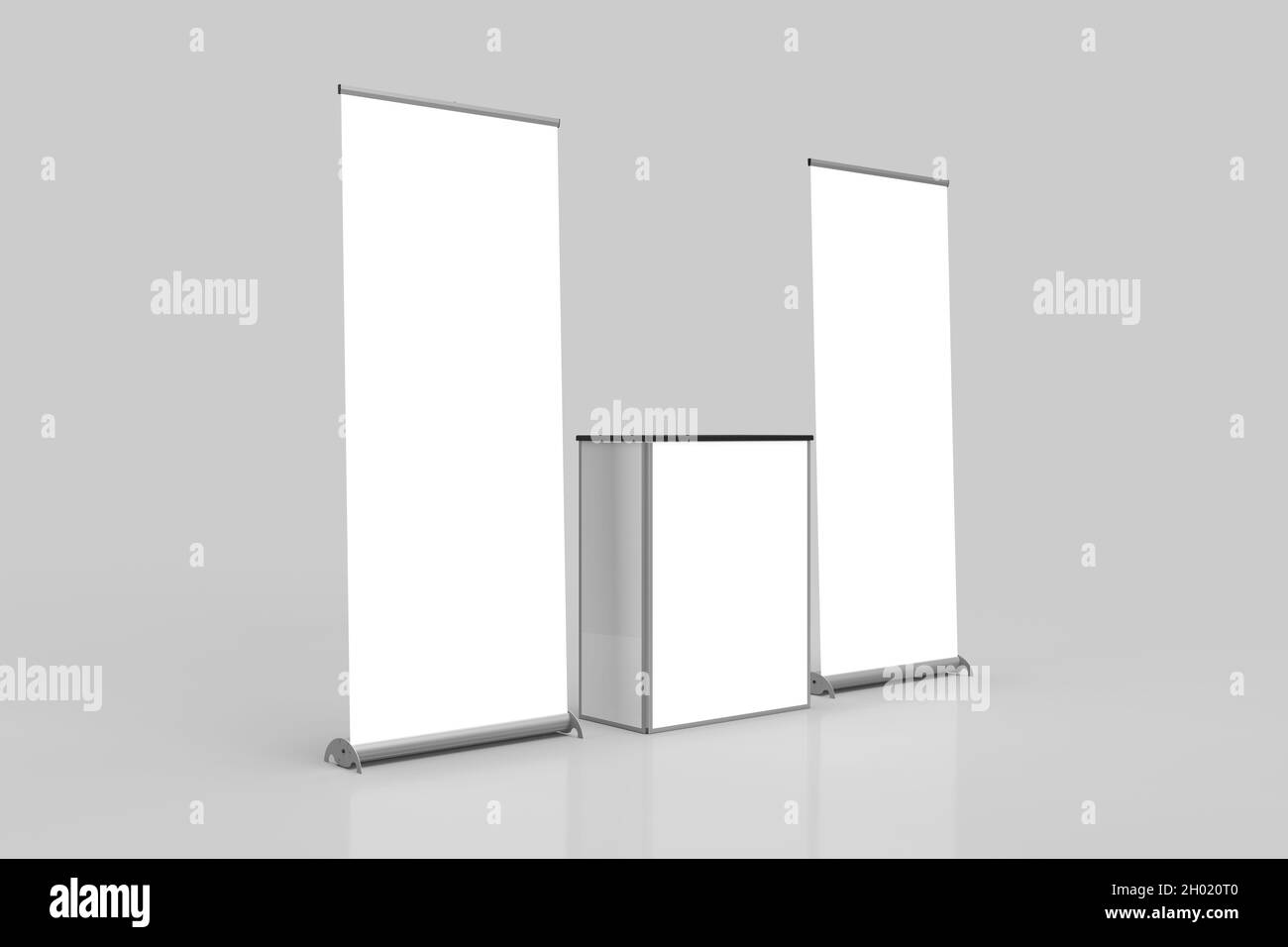 White Pullup Banner Exhibition Displays and Point of Sale Table in the middle Isolated on a grey background, Left Angled View, for mockup and illustra Stock Photo