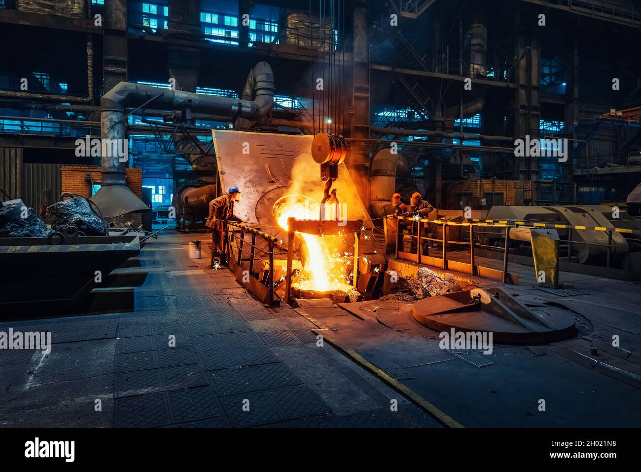 Metal cast process in blast furnace in metallurgical plant or factory