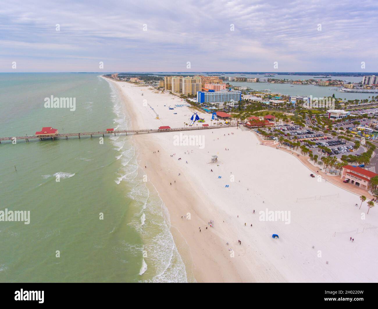 Clearwater Beach and Pier 60 Fishing Pier aerial view in a cloudy day