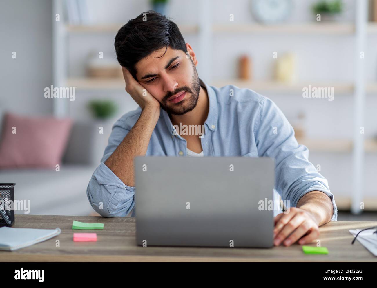 Arab businessman bored desk hi-res stock photography and images - Alamy