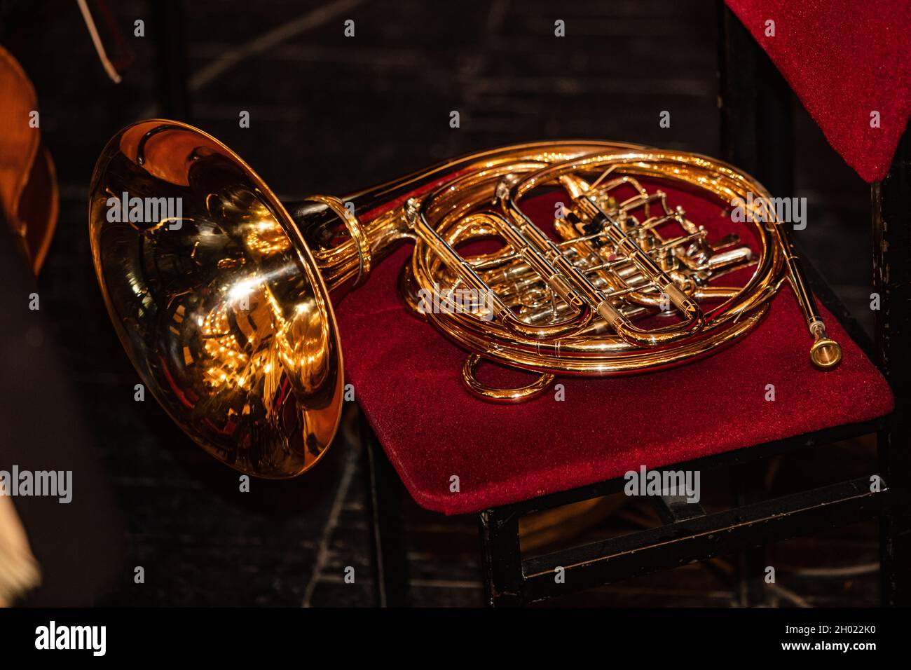 French Horn on chair during interval in theatre Stock Photo Alamy