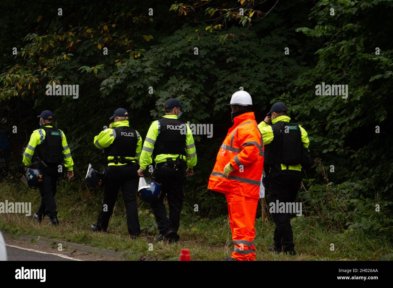 Aylesbury Vale, UK. National Eviction Team bailiffs working for HS2 assisted by HS2 Security and Thames Valley Police started evicting anti HS2 protesters holed up in big woodland fortresses at the WAR Against HS2 camp today. The land off the A413 just outside Wendover is owned by Buckinghamshire Council but has been seized by court order by HS2 Ltd. The High Speed Rail 2 rail construction is having a devastating impact upon woodland and wildlife sites in Wendover. Credit: Maureen McLean/Alamy Stock Photo