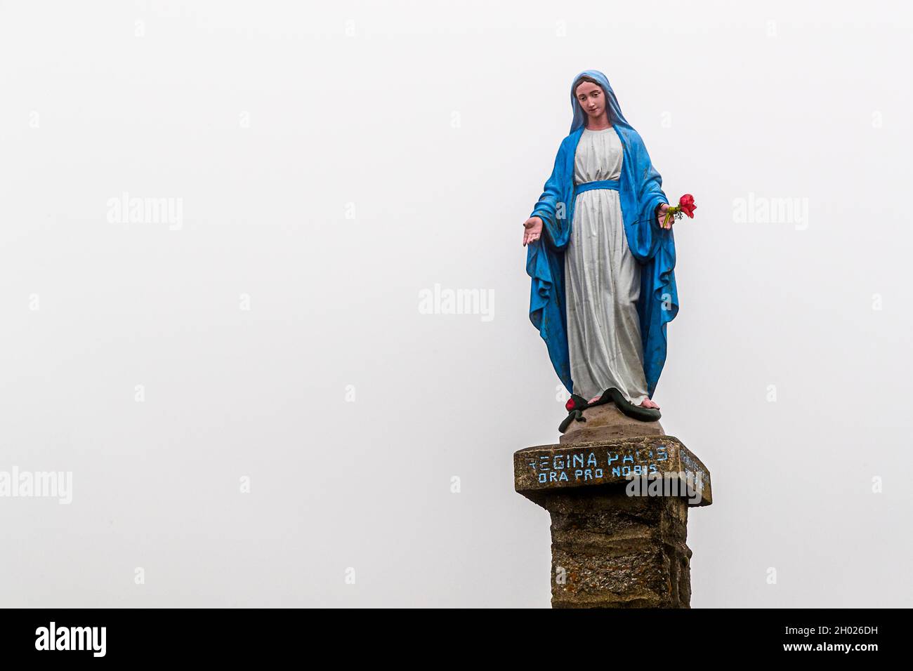 Statue of the Virgin Mary. Regina Paces ora pro nobis on top of Petit Ballon near Sondernach, France Stock Photo