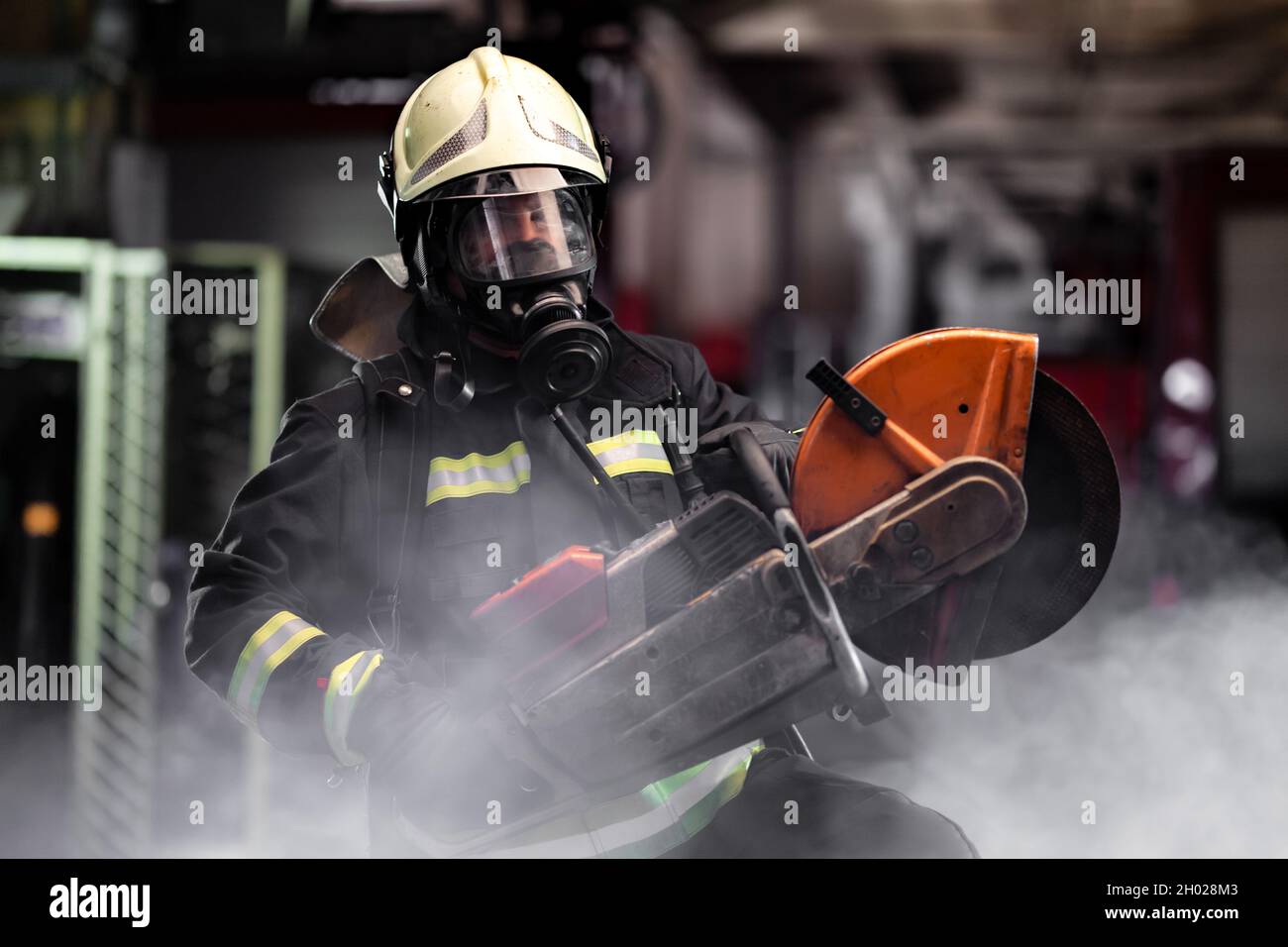 firefighter portrait wearing full equipment, oxygen mask, and power