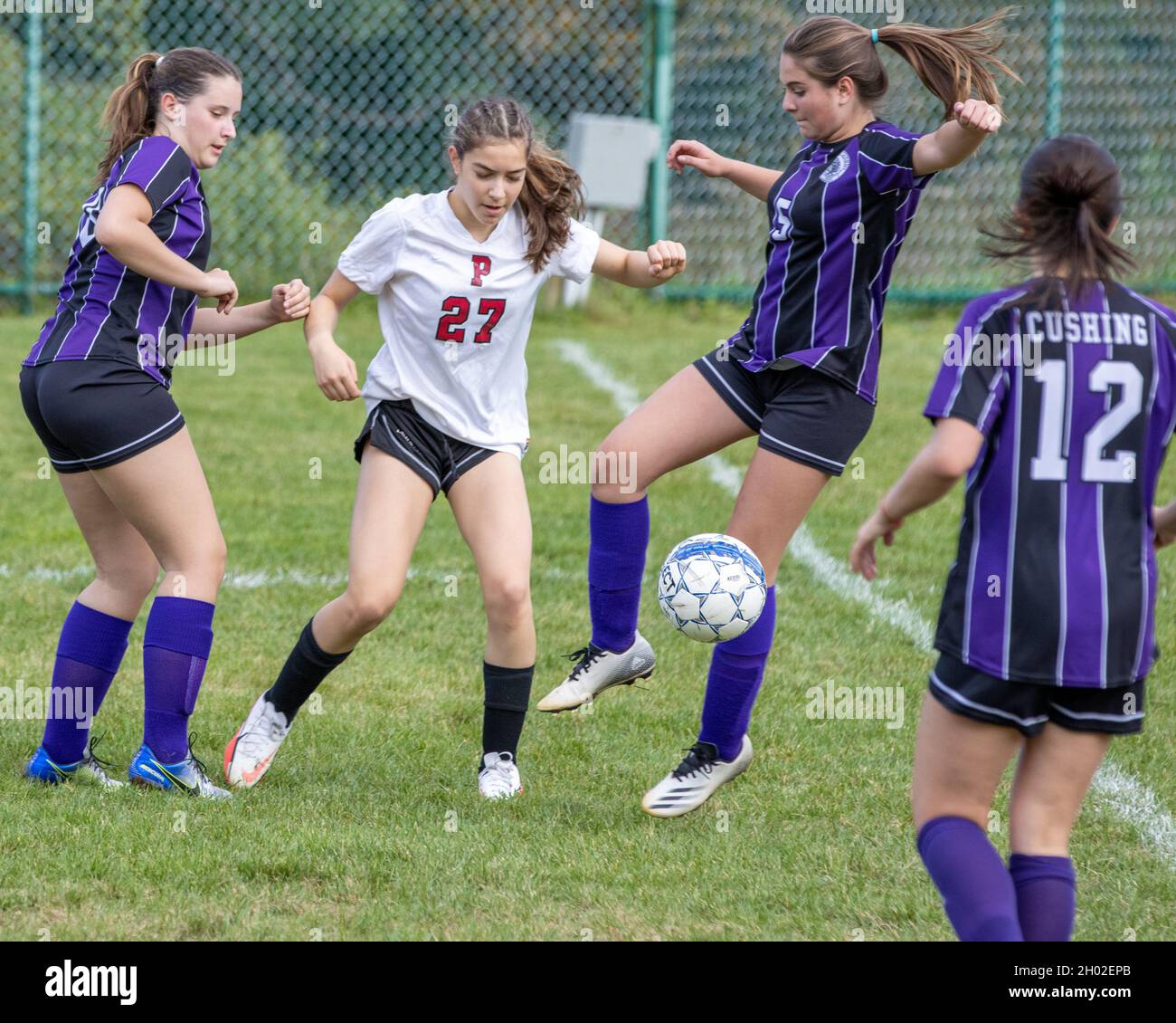 A high school girls soccer game played in Massachusetts Stock Photo