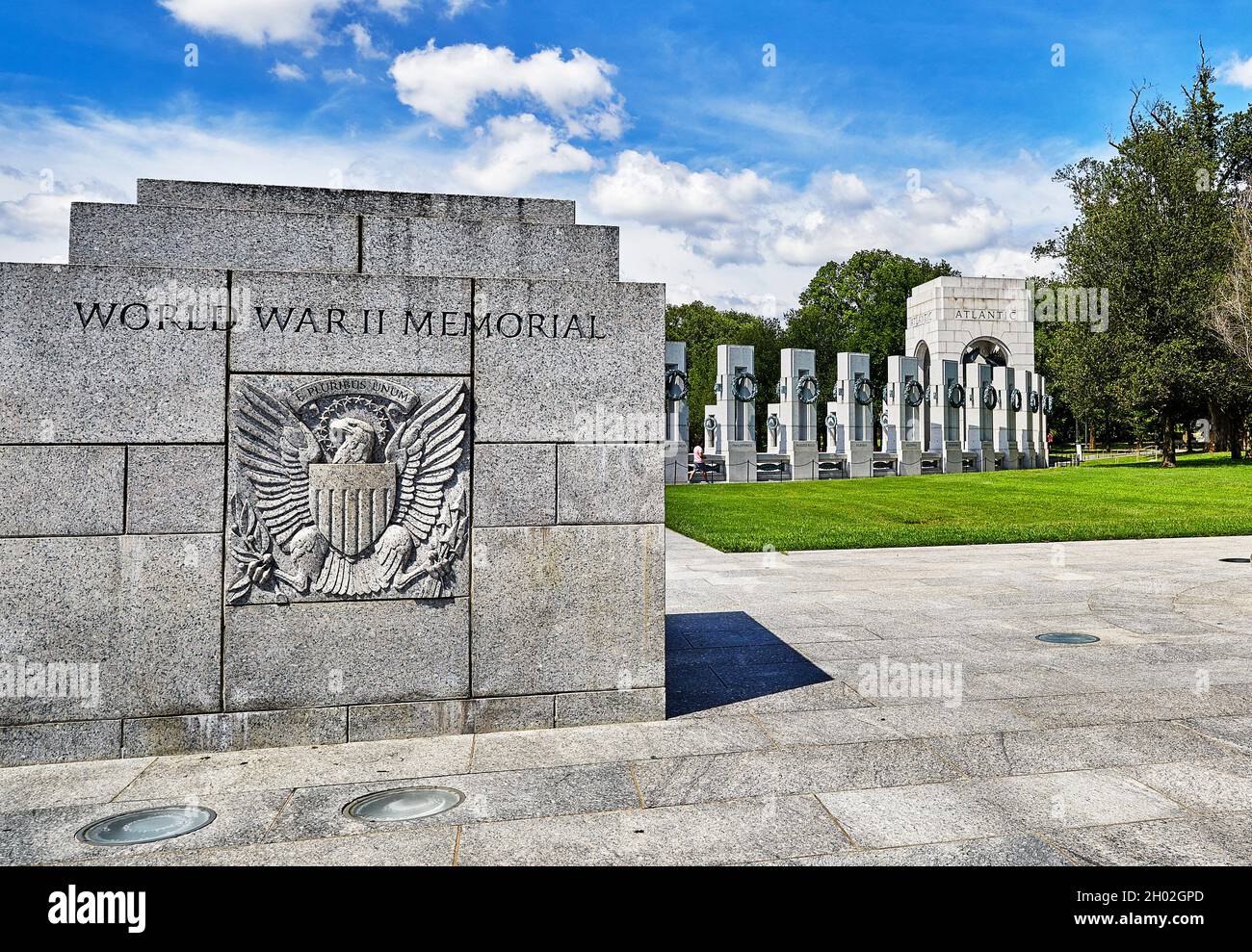 Washington DC, USA-August 19, 2021: World War II Memorial with water fountain and tourists Stock Photo