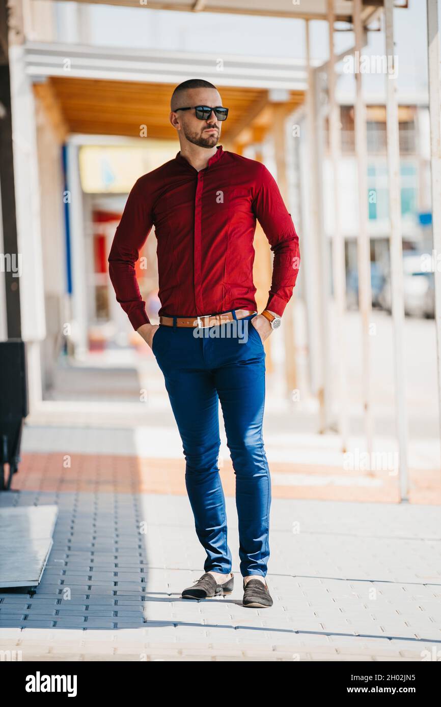 Man in Red Shirt and Brown Pants Wearing Red Sneakers Jumping · Free Stock  Photo