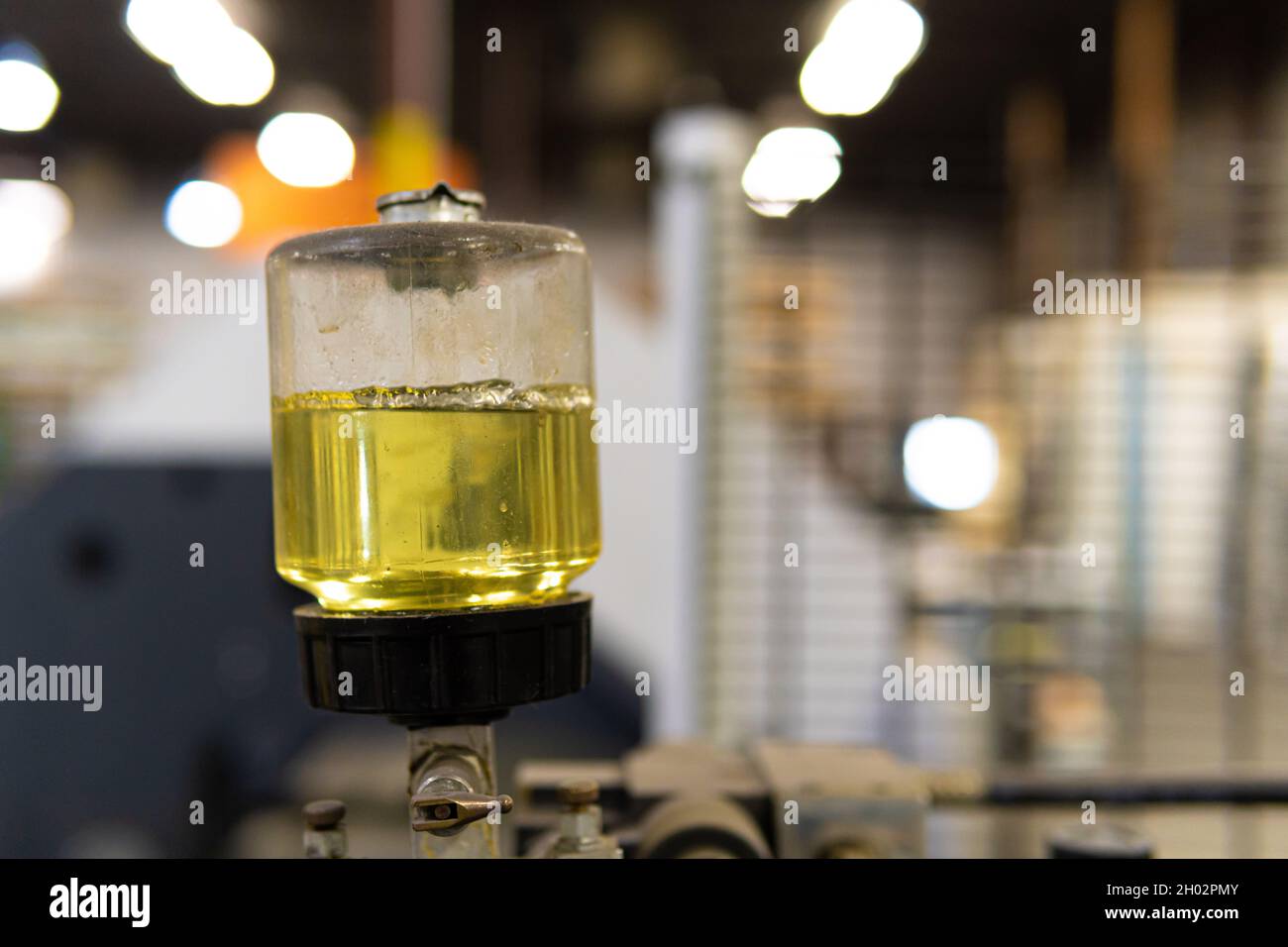 Machine Equipment Lubricant Bottle in Factory warehouse Stock Photo Alamy