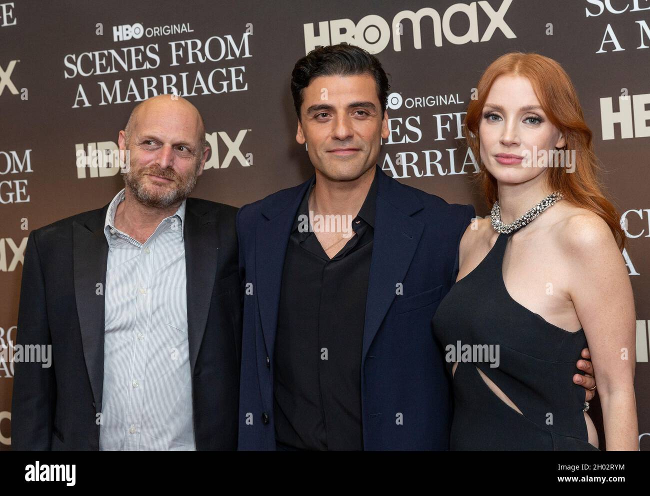 New York, NY - October 10, 2021: Hagai Levi, Oscar Isaac and Jessica Chastain attend screening of HBO Scenes From A Marriage at Museum of Modern Art Stock Photo