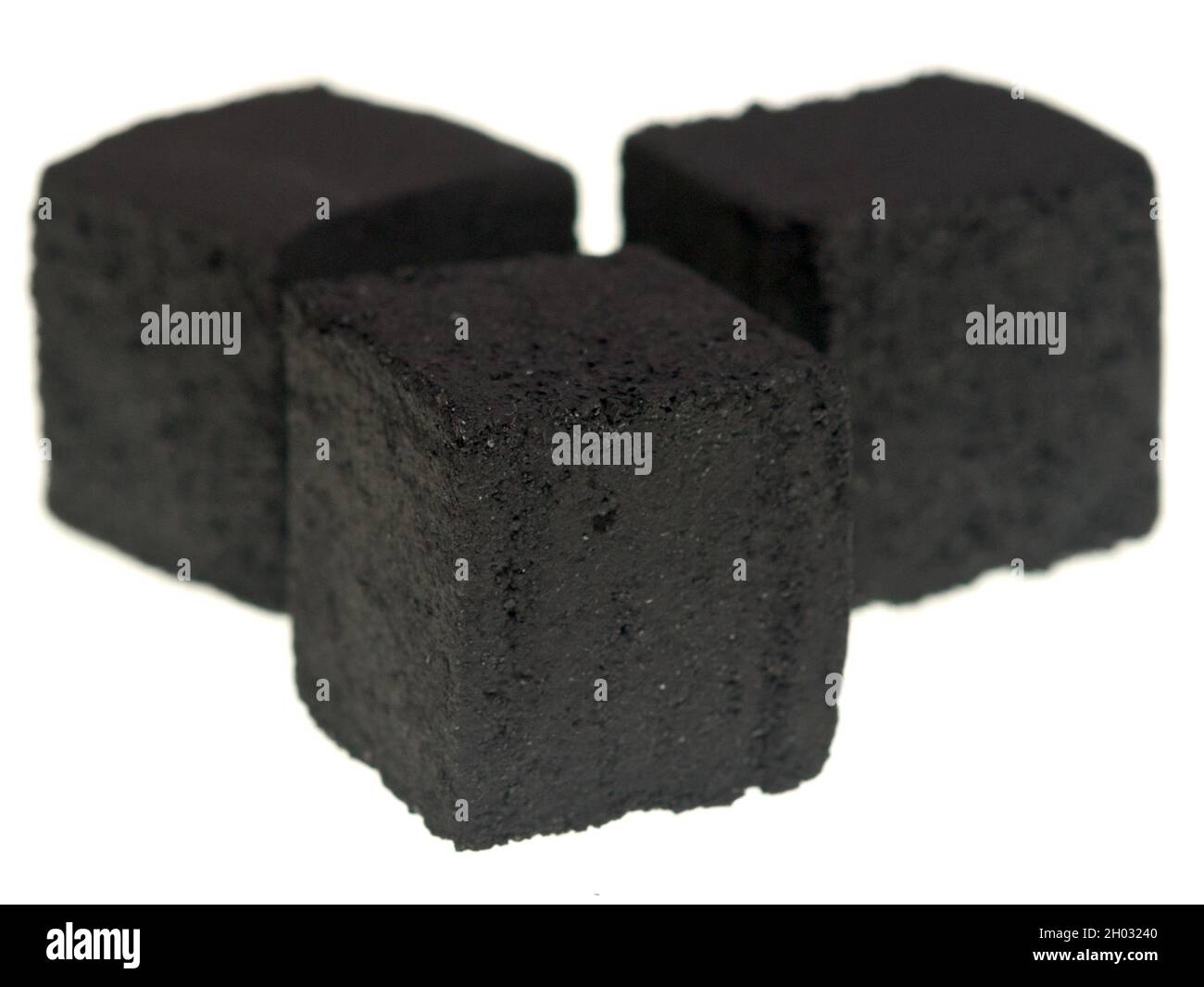 Charcoal cubes for hookah on white background Stock Photo
