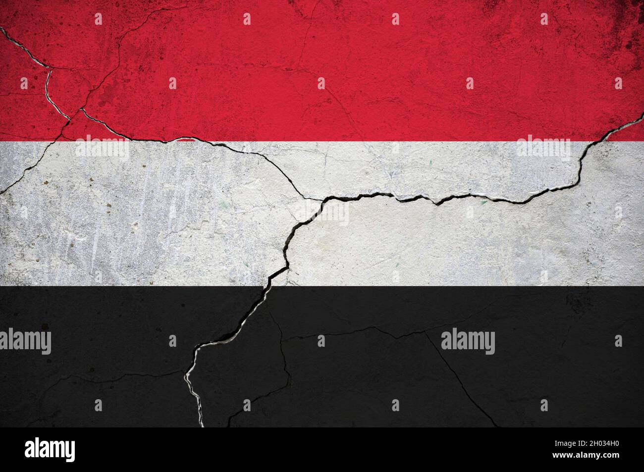An image of the Yemen flag on a wall with a crack. Background Stock ...