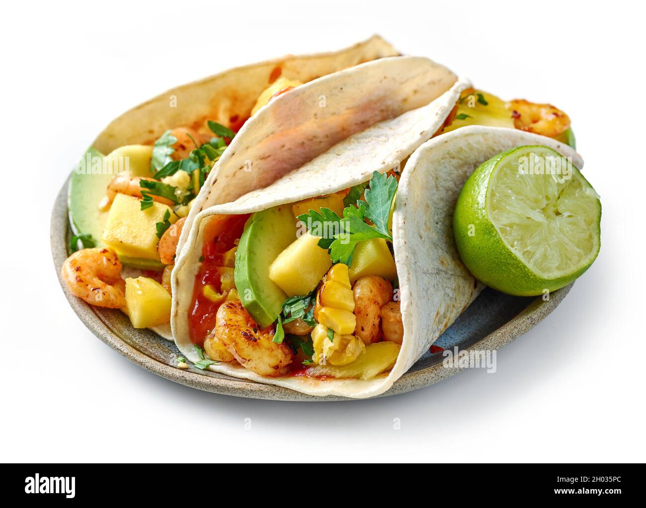Plate of Mexican food Tacos isolated on white background Stock Photo