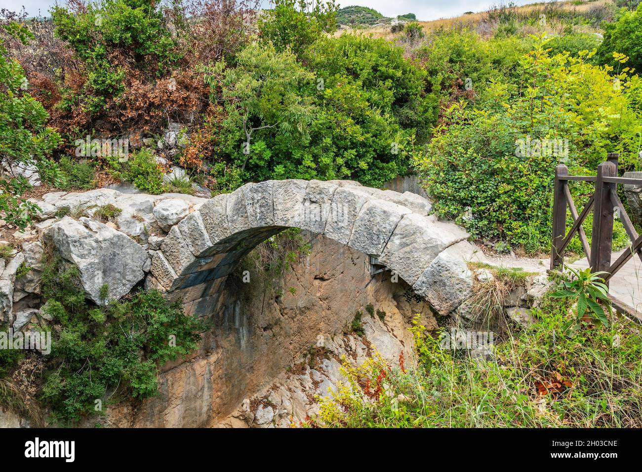 Hayat Samandag Vespasianus Titus Tunnel Breathtaking Picturesque View of Bridge on a Blue Sky Day in Summer Stock Photo
