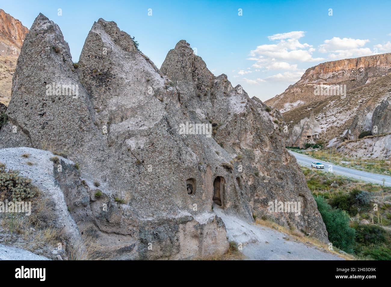 Soganli Valley Breathtaking Picturesque View of Rock-Cut Houses and Cloisters on a Blue Sky Day in Summer Stock Photo