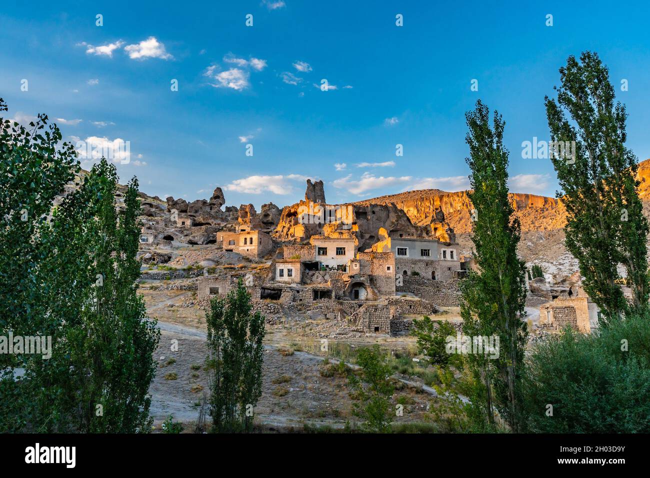 Soganli Valley Breathtaking Picturesque View of Village Houses during Sunset on a Blue Sky Day in Summer Stock Photo