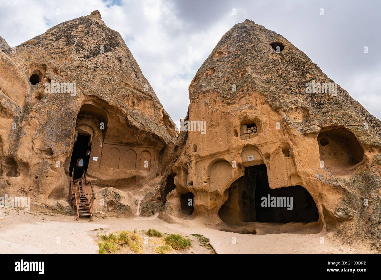 Selime Cathedral Breathtaking Picturesque View of Rock-Cut Houses and Churches on a Blue Sky Day in Summer Stock Photo
