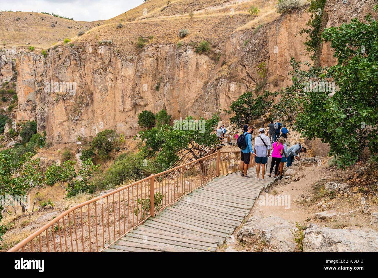 Ilhlara Valley Breathtaking Picturesque View of Visitors walking Downstairs on a Blue Sky Day in Summer Stock Photo
