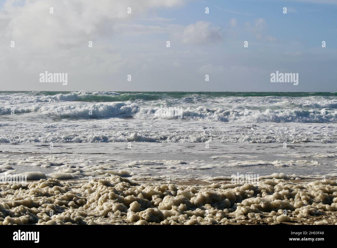 Porthtowan - Spume or Sea Foam Stock Photo