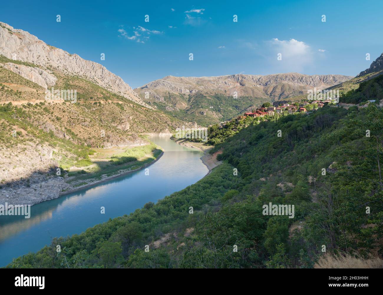 General view of the touristic town of Kemaliye. The Euphrates river flows in the valley of Kemaliye district. Stock Photo